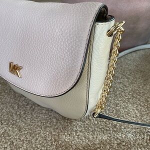 Michael Kors cream/blush color crossbody leather bag.